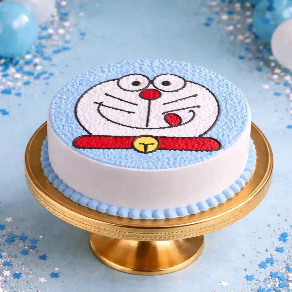 Doraemon Face Theme Birthday Cake - TF Cakes Online Delivery Freshly baked handcrafted Doraemon Face Theme Birthday Cake – Cake design by TF Cakes