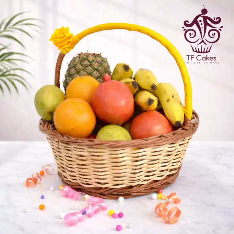 Festive Fruit Basket with Premium Seasonal Fruits - TF Cakes Online Delivery Freshly baked handcrafted Festive Fruit Basket with Premium Seasonal Fruits – Cake design by TF Cakes