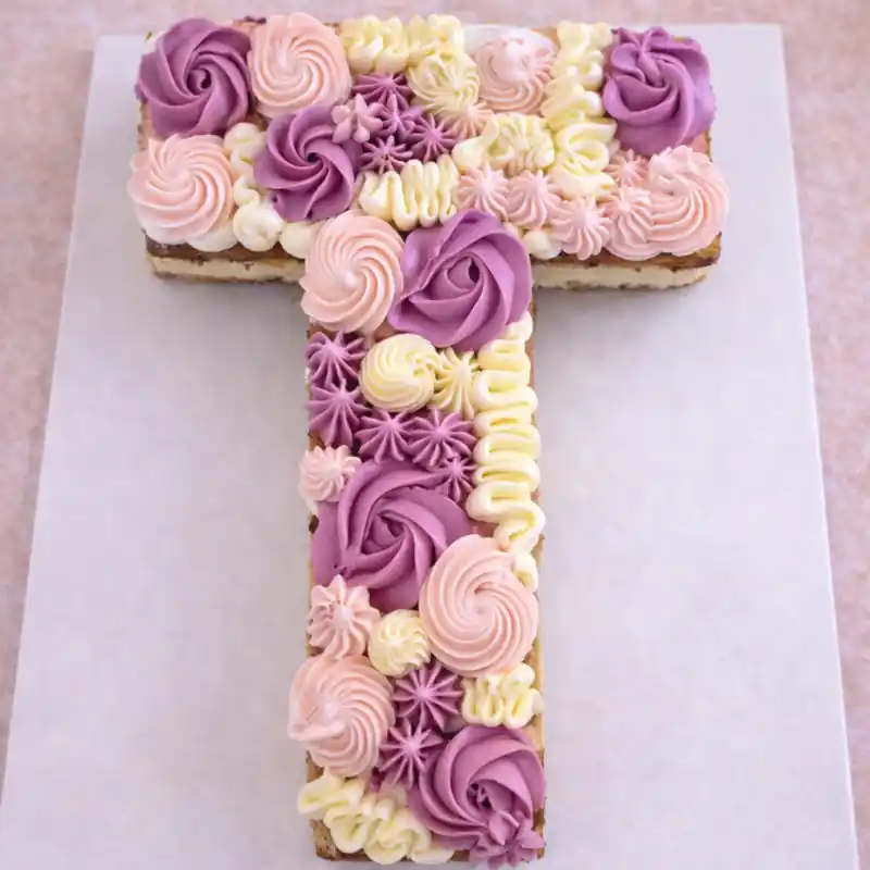 Lavender Bloom Letter T Cake - TF Cakes Online Delivery Freshly baked handcrafted Lavender Bloom Letter T Cake – Cake design by TF Cakes
