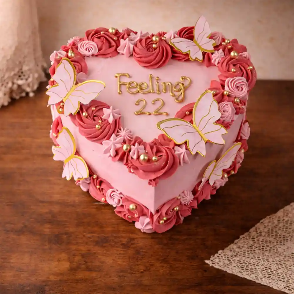 Butterfly Theme Pink Heart Cake - TF Cakes Online Delivery Freshly baked handcrafted Butterfly Theme Pink Heart Cake – Cake design by TF Cakes