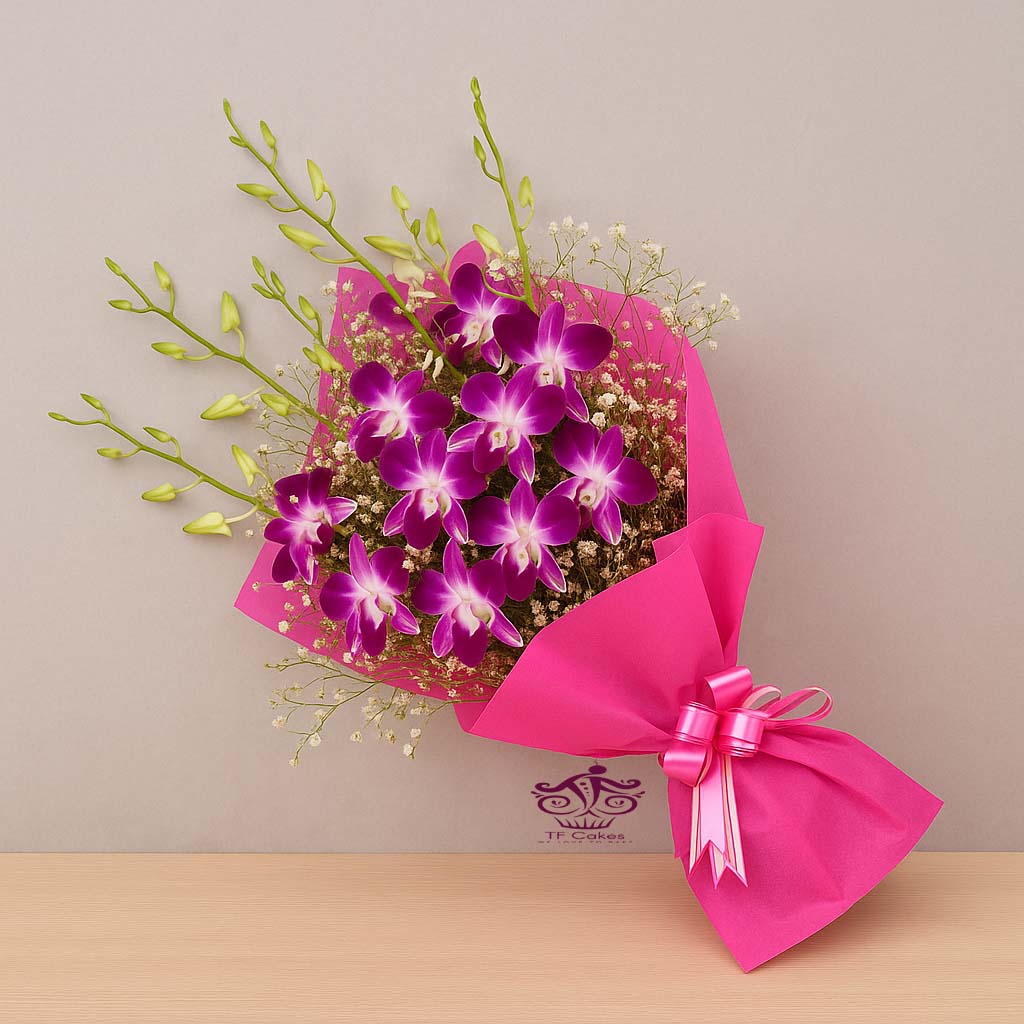 Elegant Orchid Bouquet in Pink Wrap - TF Cakes Online Delivery Freshly baked handcrafted Elegant Orchid Bouquet in Pink Wrap – Cake design by TF Cakes